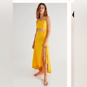Free People Maxi Dress with button detail and cut out waist.